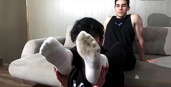 Handsome guy has his sock and foot worship