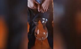 pissing in a big glass for my fag